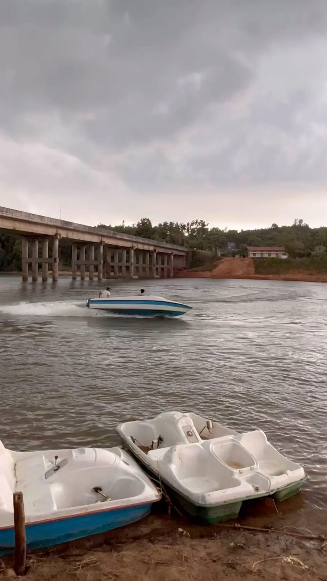 River Queen Boating Puttur speed boat ride near bridge