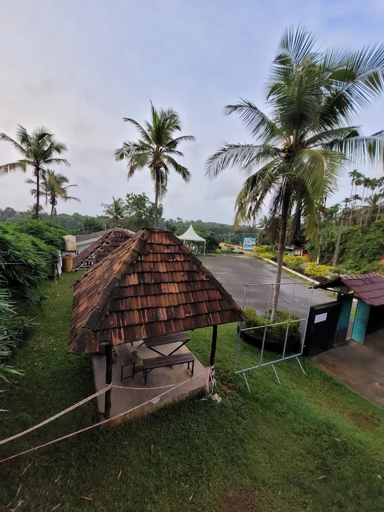 Unique container cafe architecture and lakeside seating at River Queen Puttur