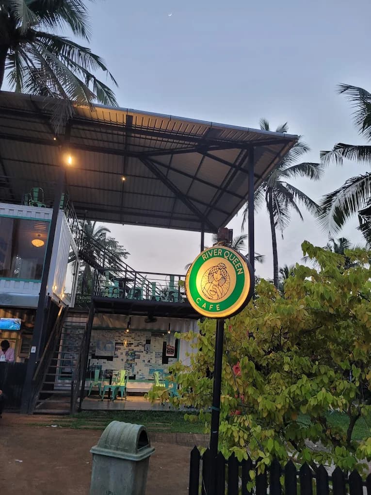 Side view of River Queen container cafe near Shantimogaru, Puttur