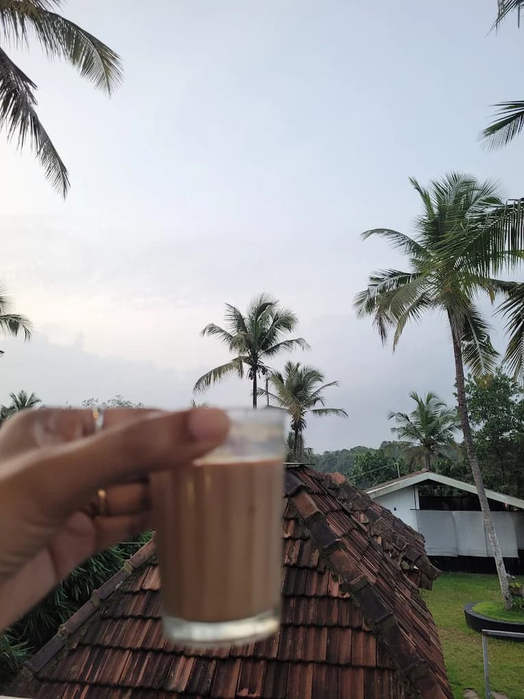 Authentic Dum Chai tea at River Queen, the best lakeside cafe in Puttur near Shantimogaru