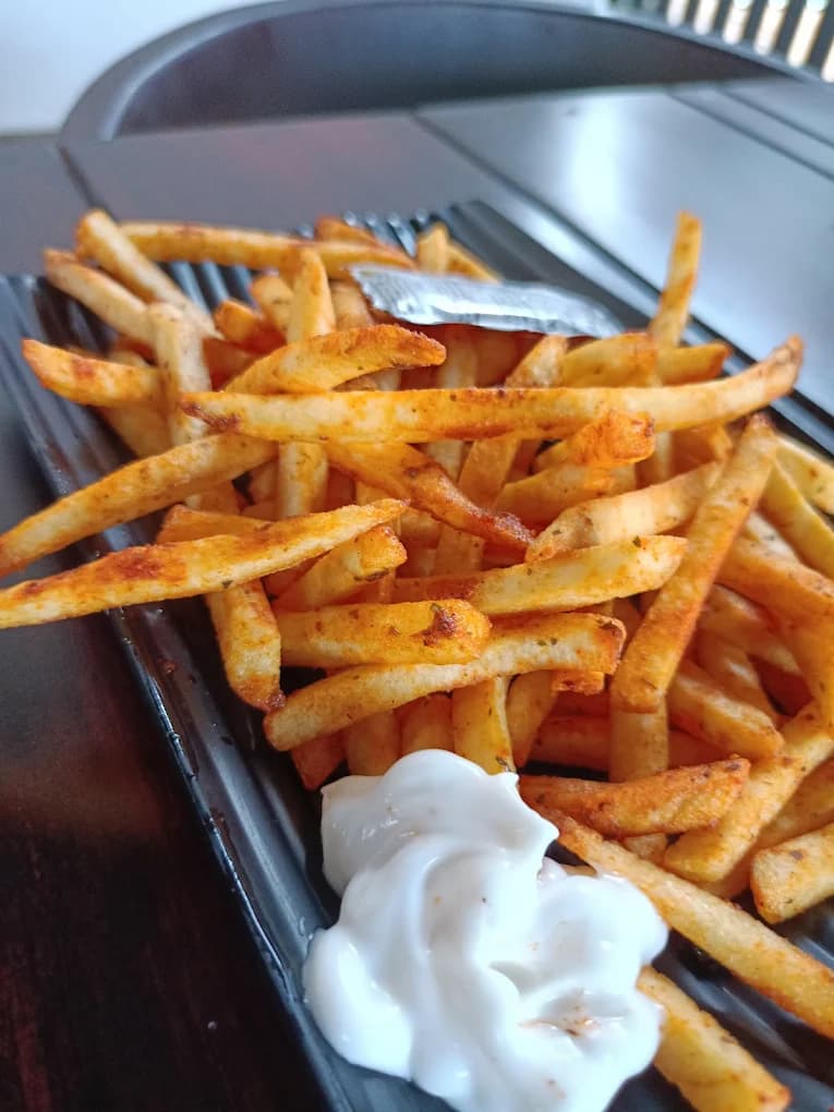 Crunchy fried chicken bites - best starters at River Queen lakeside cafe in Puttur