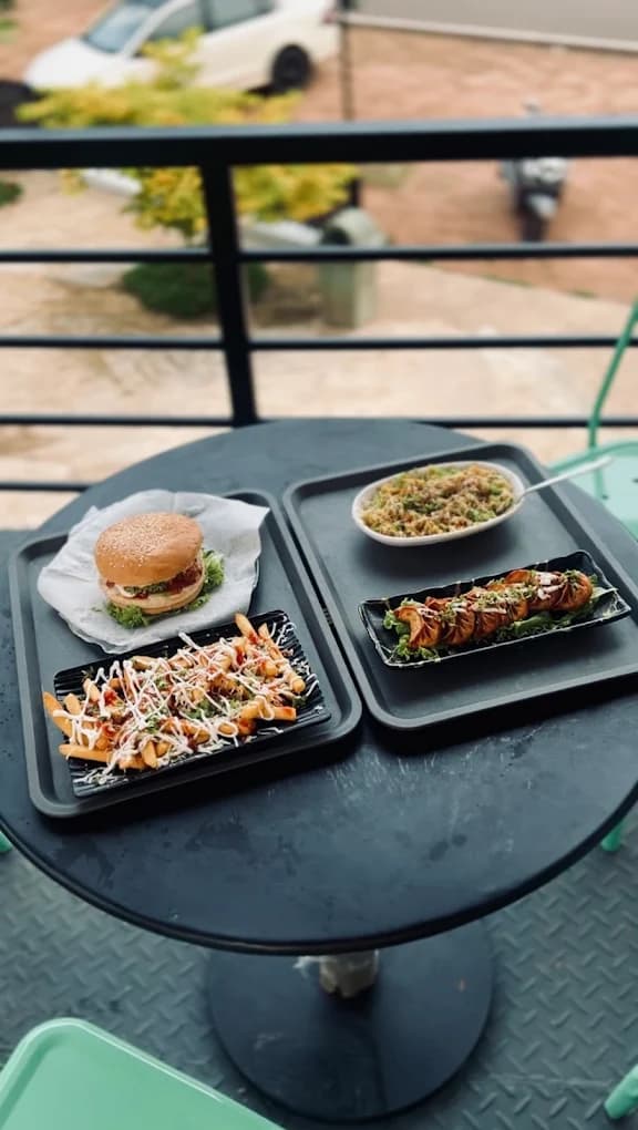 White sauce pasta and juice combo at River Queen lakeside cafe Shantimogaru