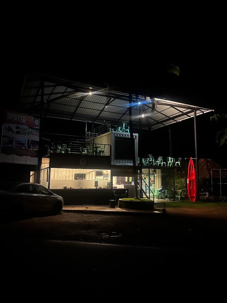 Rooftop night view at River Queen, the most unique lakeside cafe in Puttur